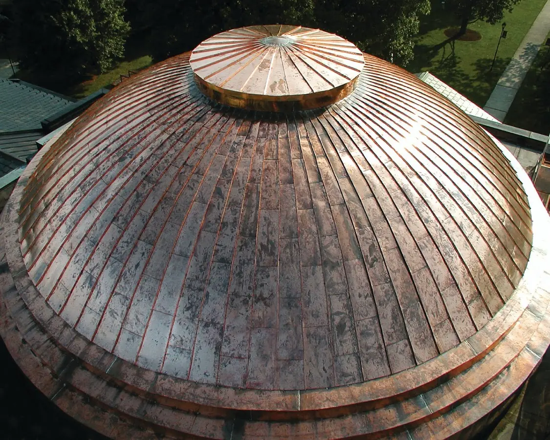 Craftsman Roofing crew installing a new roof in Jean